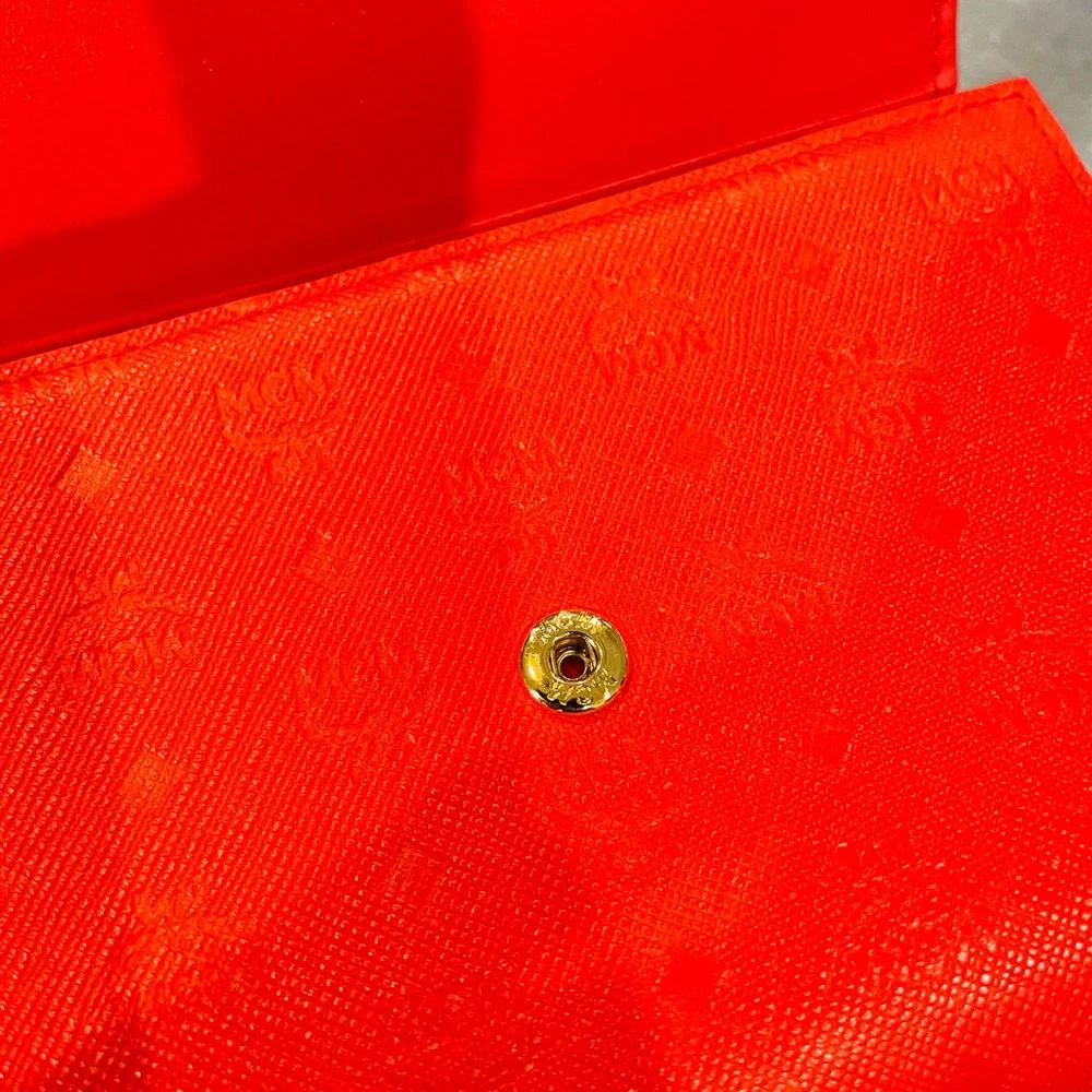 MCM Embossed Leather Compact Wallet